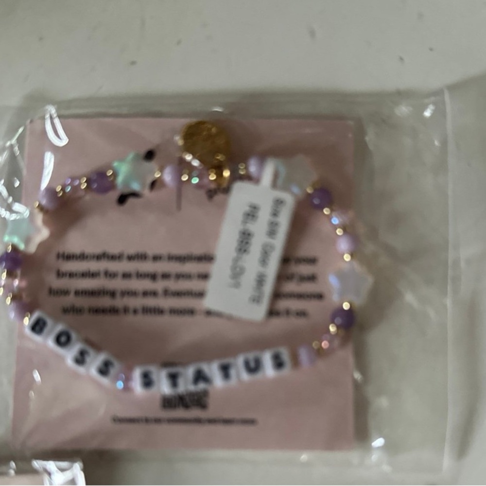 Peloton New Purple and White Beaded Bracelet Boss Status